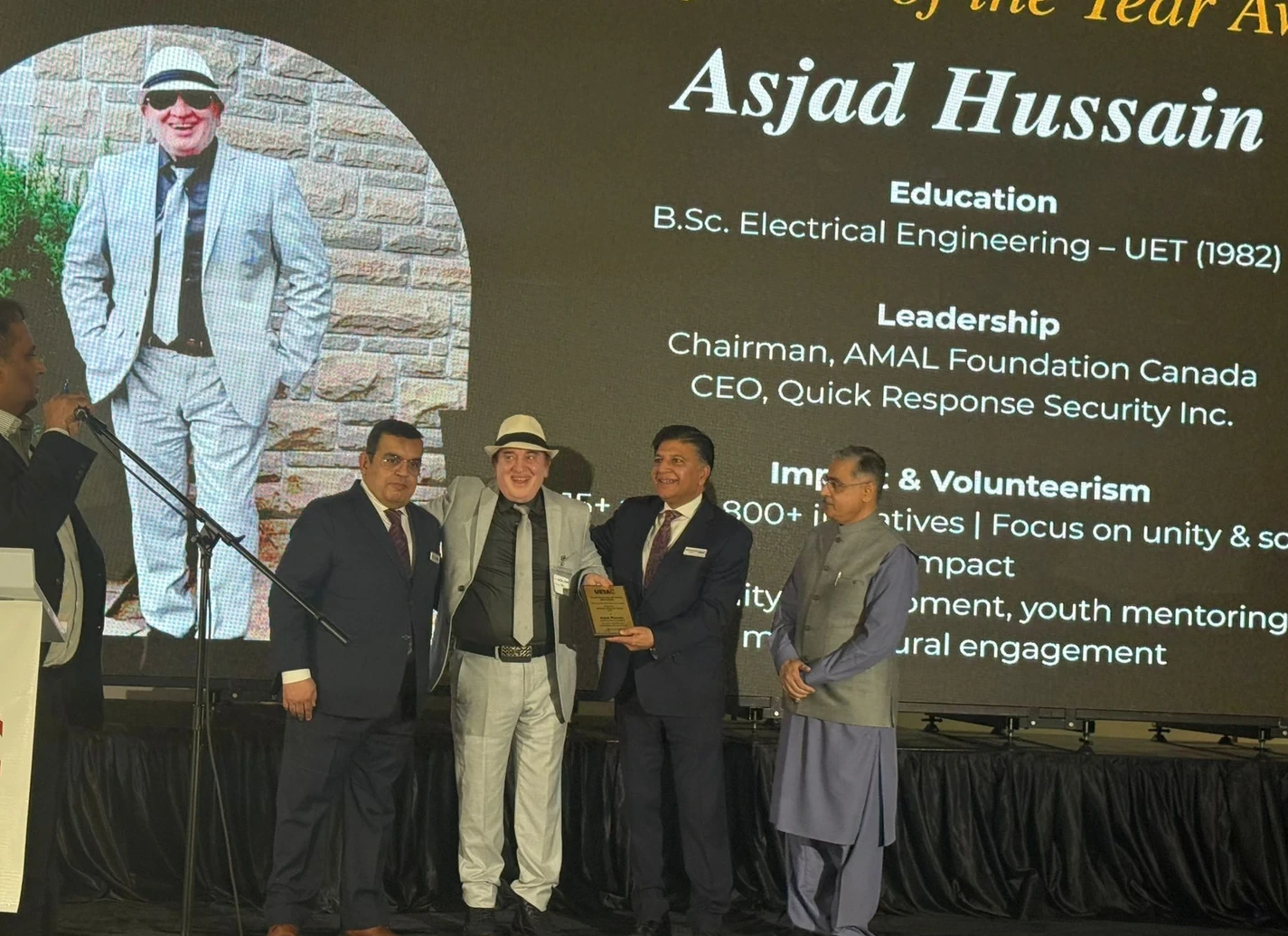 2026 UETA award event stage with Asjad Hussain's biography displayed